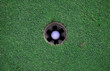 golf ball in hole