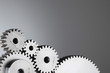 © eyeami - zahnrad getriebe teamwork netzwerk