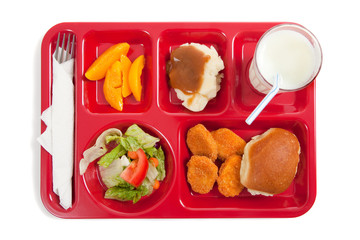 school lunch tray with food on it on a white backgrounf