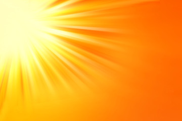 Bright orange sun rays background