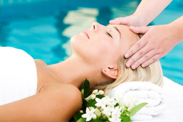 Beautiful young woman getting a spa treatment