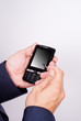 © legaa - Hands working on a mobile telephone