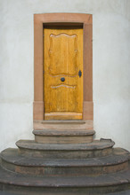Wooden Door With Sandstone Frame