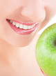 healthy teeth and green apple