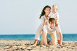 © Alena Yakusheva - happy family on beach