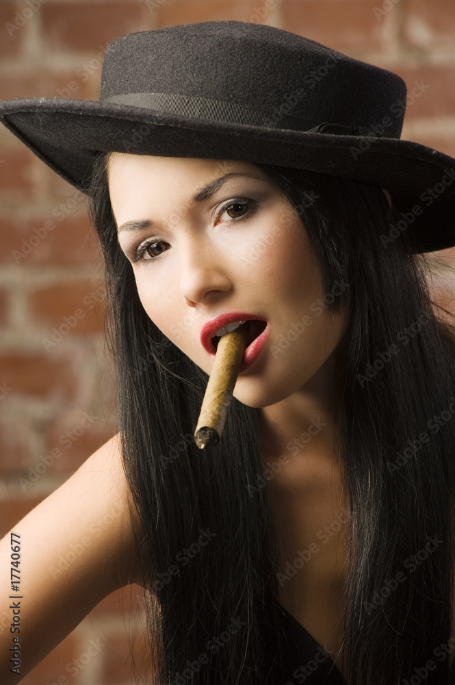 japanese girl smoking a cigar Stock Photo