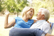 © Monkey Business - Portrait Of Senior Couple Enjoying Day In Park