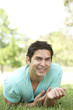 © Monkey Business - Portrait Of Young Man In Park
