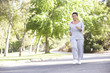 © Monkey Business - Senior Woman Jogging In Park