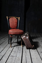 Old Chair And Suitcase