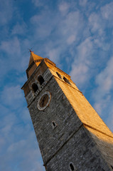 Old mediterranean church tower made of stone