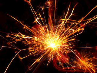 Wall Mural - Christmas sparkler on black background