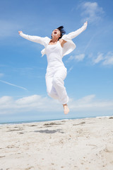 Canvas Print - happy healthy jumping woman