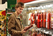 Young man in supermarket