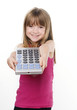 © BCFC - Cute adorable child holding remote control