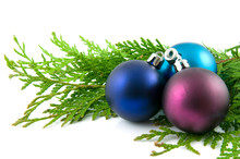 Three Christmas Balls With Green Branches