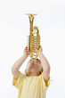 © courtyardpix - boy with toy trumpet