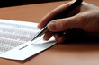 © Sergey Nivens - hand with black pen sign the document