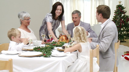 Wall Mural - Homely Christmas Dinner with all the family