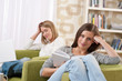 © CandyBox Images - Students - Two female teenager studying in modern living room