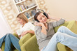 © CandyBox Images - Students - Two female teenager relaxing in lounge