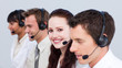 © WavebreakMediaMicro - Smiling woman working in a call center with her colleagues