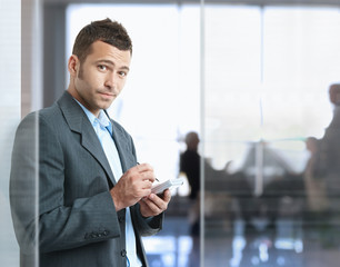 Canvas Print - Businessman using smartphone