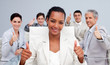 © WavebreakMediaMicro - Happy business team celebrating a sucess with thumbs up