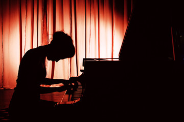 woman playing piano