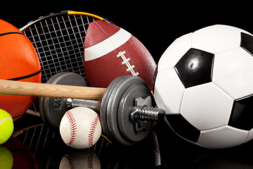 Wall Mural - Assorted sports equipment on black