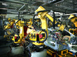 welding robots in a car manufactory