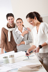 Wall Mural - Female interior designer with two clients at office