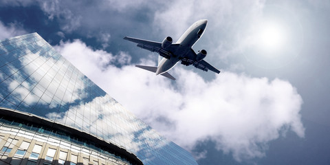 Wall Mural - Airplane on  the blue sky