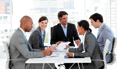 Wall Mural - Multi-ethnic business people disscussing a budget plan