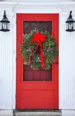 wreath on red front door