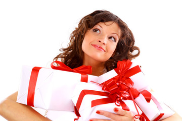 Excited attractive woman with many gift boxes and bags...