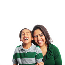 Happy Mother And Son Laughing Dressed In Green