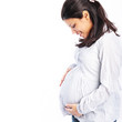 © Monart Design - Happy pregnant woman holding her stomach