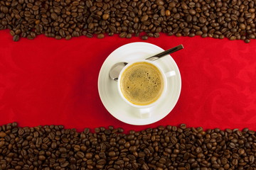 coffee cup from above with coffee beans