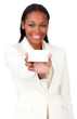 © WavebreakMediaMicro - Afro-american businesswoman holding a white card sign