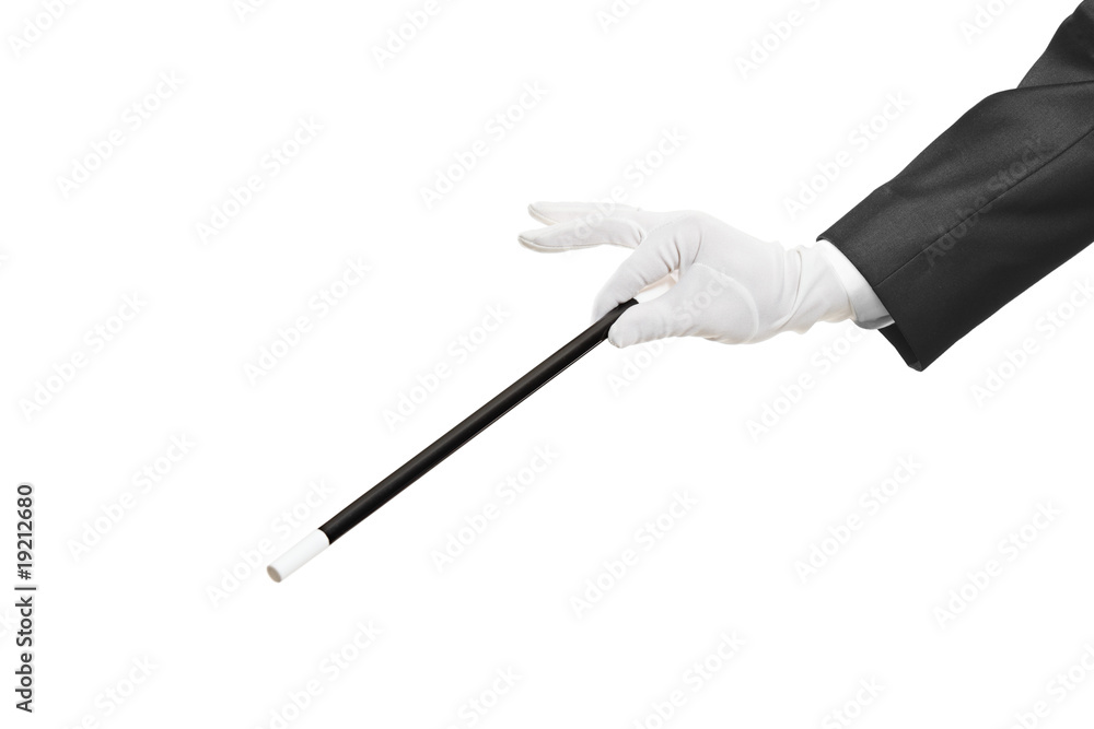 Hand holding a magic wand isolated on white background - obrazy, fototapety, plakaty 