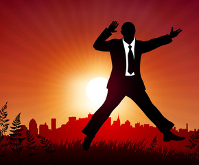 Wall Mural - excited businessman on sunset background