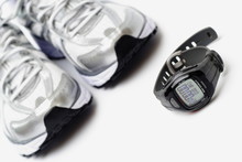 Sport Watch And Pair Of Running Shoes