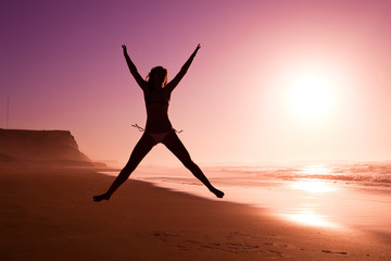 Wall Mural - jumping on the beach