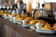Dishes With Snacks On Bar Counter