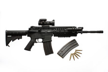 Modern Assault Rifle With A Scope And Extra Magazine And Bullets