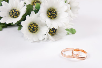 Wedding rings and flowers