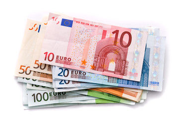 Euro banknotes isolated on a white with soft shadows