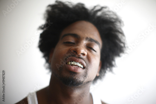 Cuadros en Lienzo Man with gold and diamond teeth