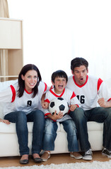 Wall Mural - Animated family watching a football match